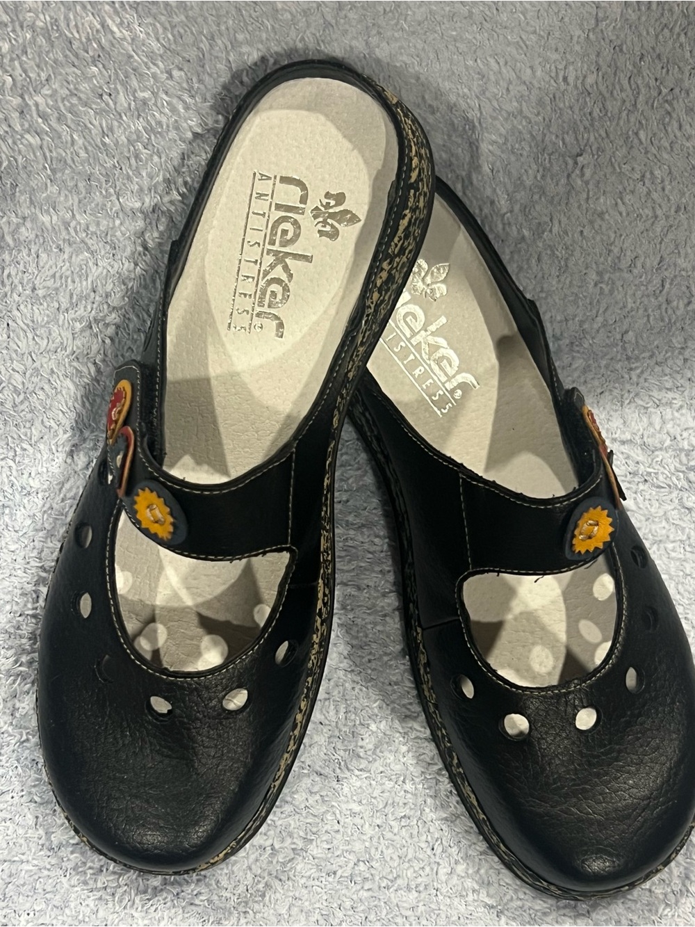 Rieker Black Slip-On Mary Jane Clogs with Yellow Flower Accents